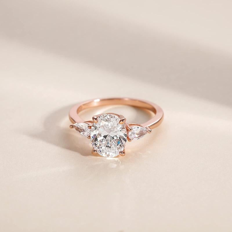 S925 Elegant Pear Accented Oval Brilliant Cut Ring in rose gold