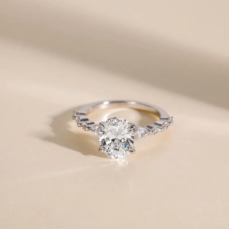 Elegant Oval Set Accented Band Ring