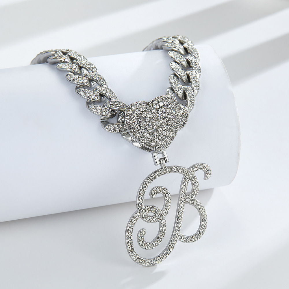 Cursive Diamond Accented Initial Cuban Heart Necklace in silver