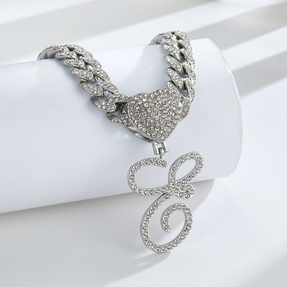 Cursive Diamond Accented Initial Cuban Heart Necklace in silver