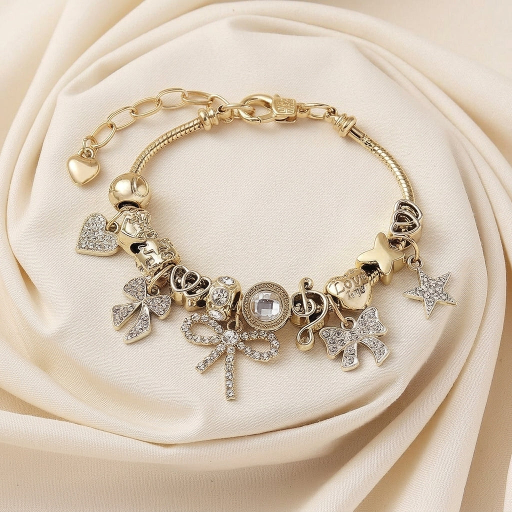 Elegant Bow & Heart Charm Bracelet in gold