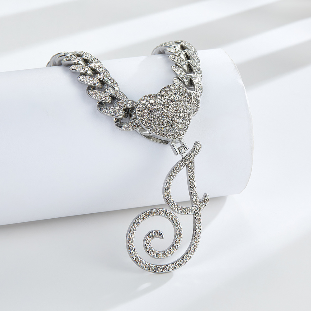 Cursive Diamond Accented Initial Cuban Heart Necklace in silver