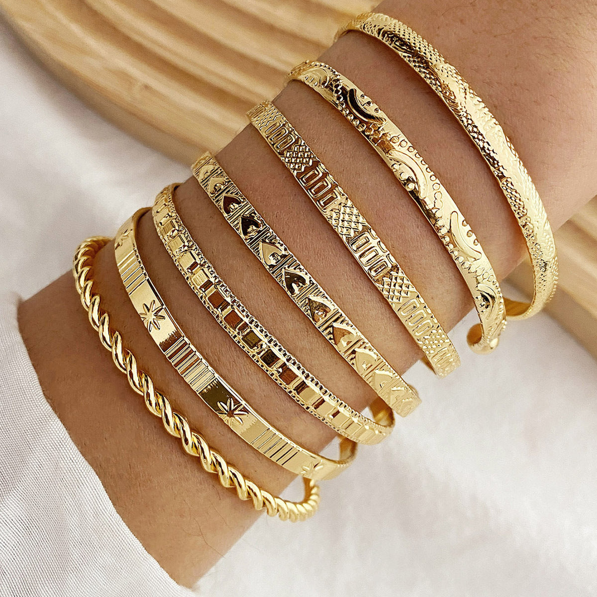 7pc Adjustable Textured Cuff Stack in gold