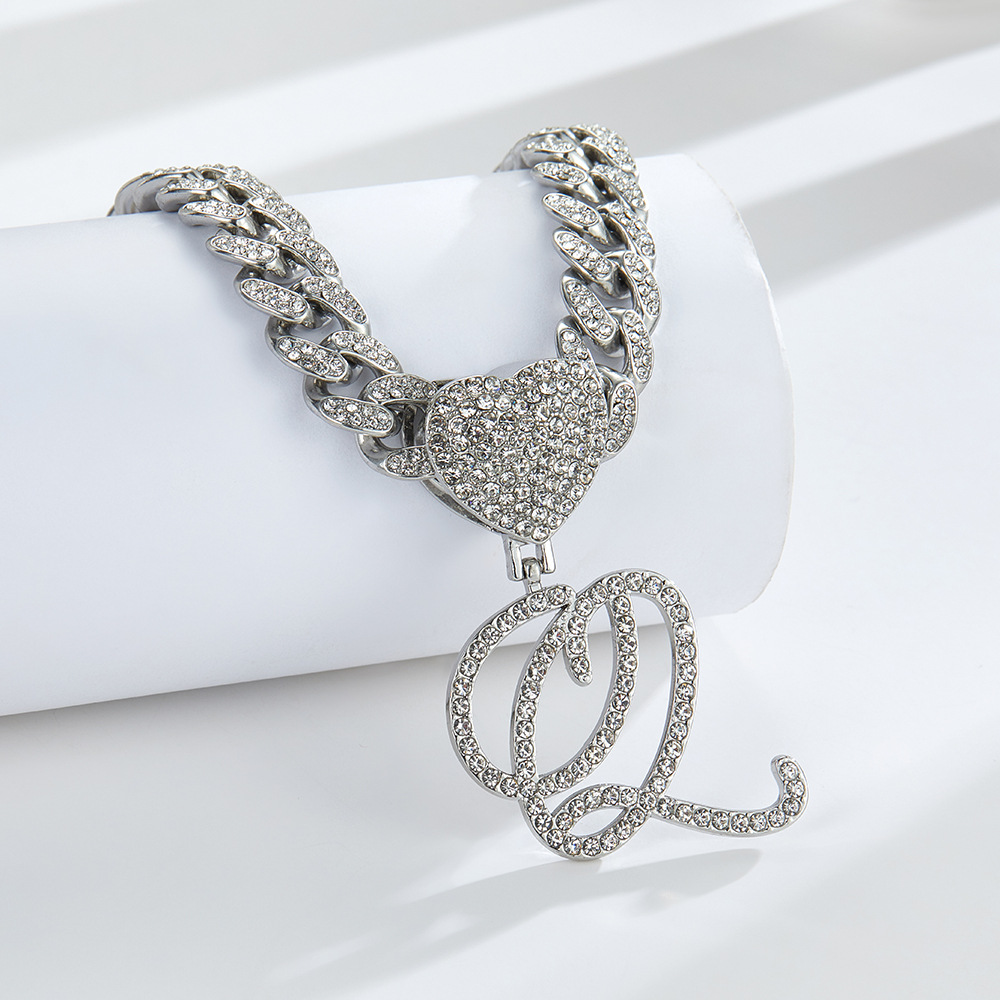 Cursive Diamond Accented Initial Cuban Heart Necklace in silver