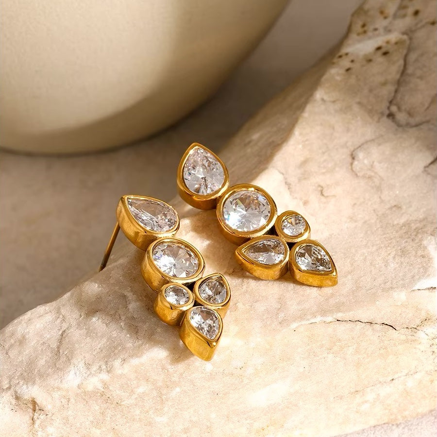Dainty Leaf Diamond Earrings in gold