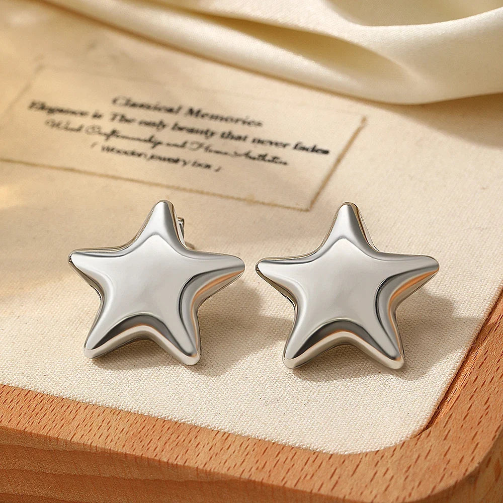 Flashy Star Stud Earrings in silver