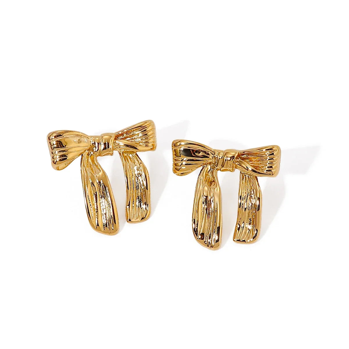 Feminine Textured Bow Earrings