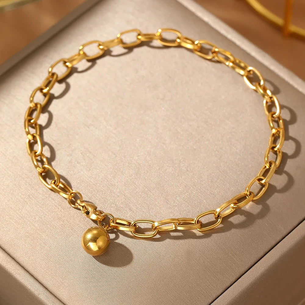 Chunky Paperclip Tassel Ball Bracelet in gold