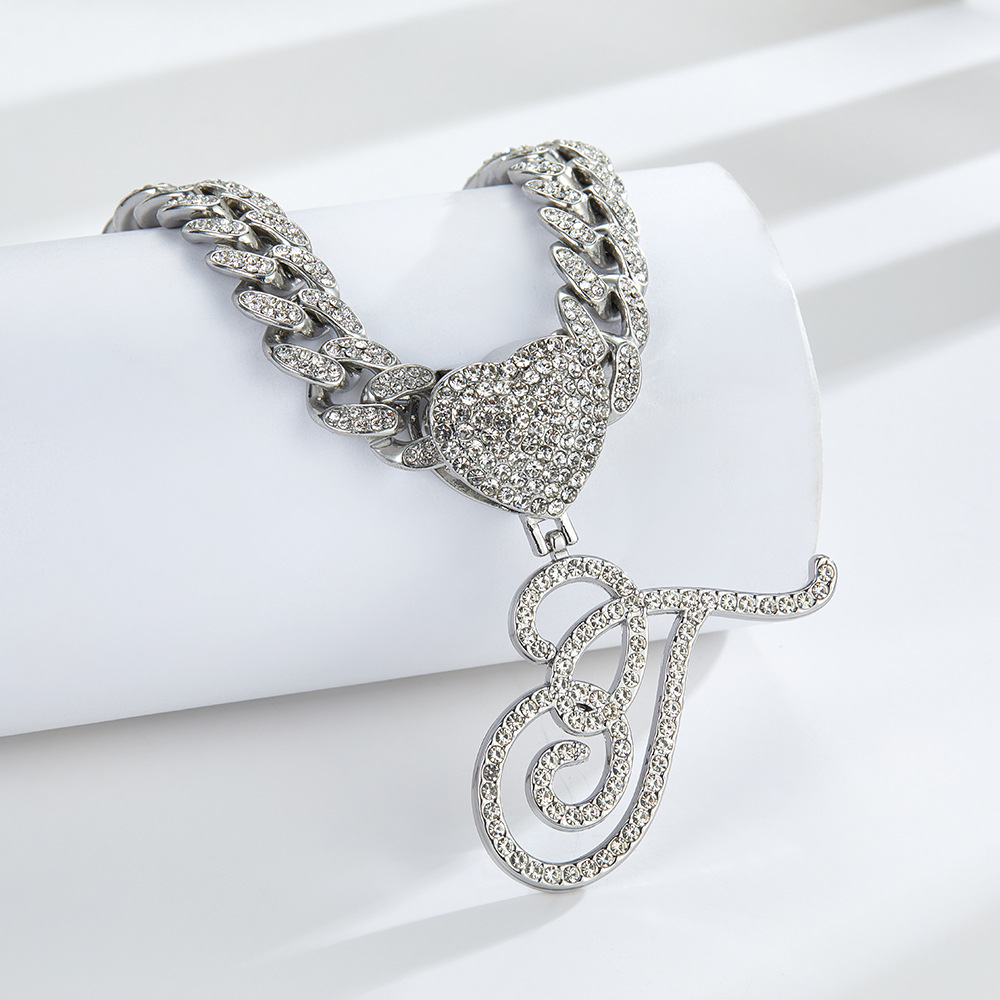 Cursive Diamond Accented Initial Cuban Heart Necklace in silver