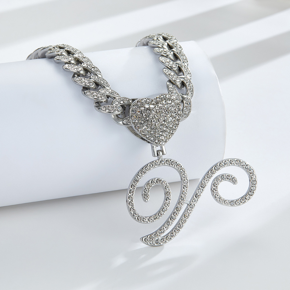 Cursive Diamond Accented Initial Cuban Heart Necklace in silver