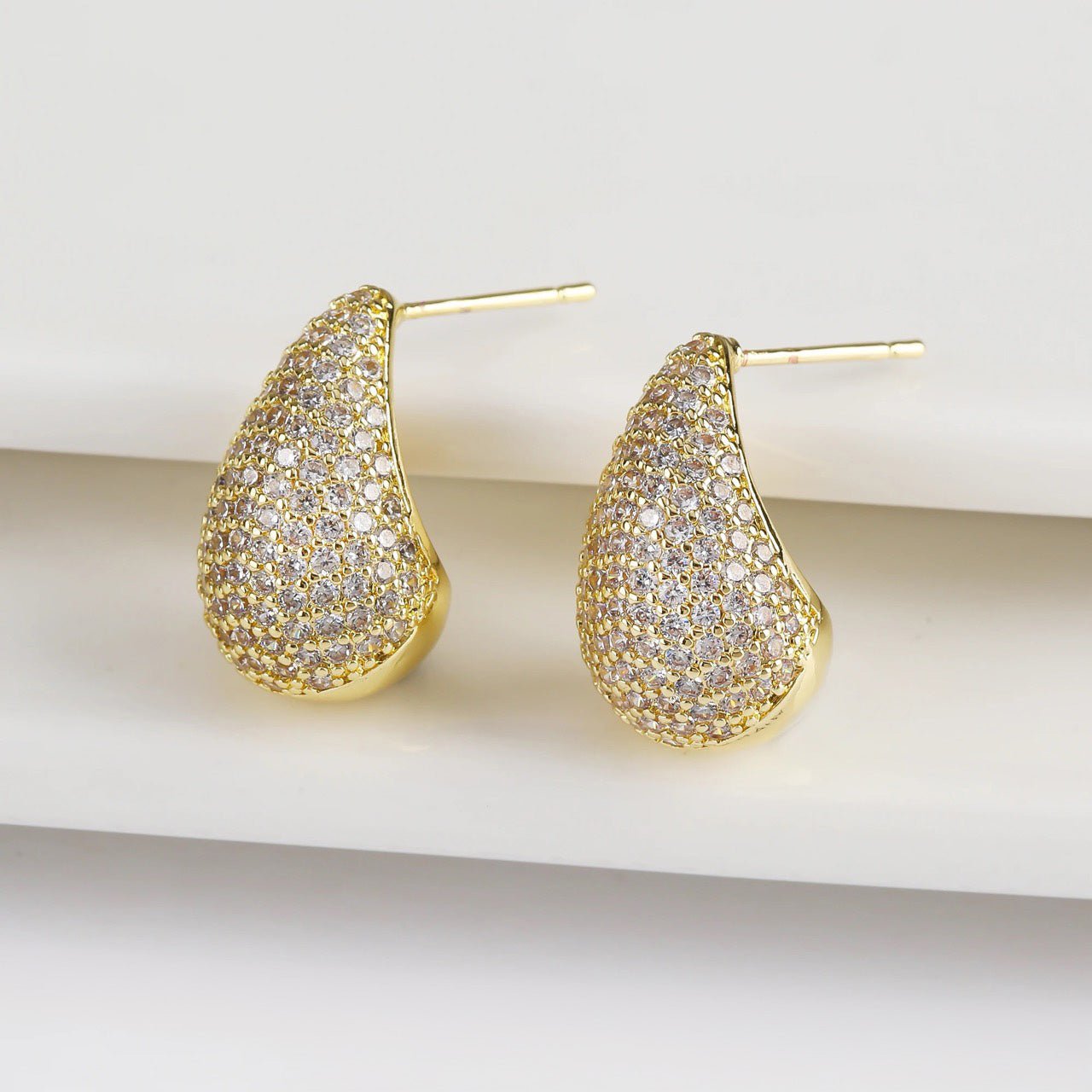 Dainty Glimmering Diamond Teardrop Earrings in white