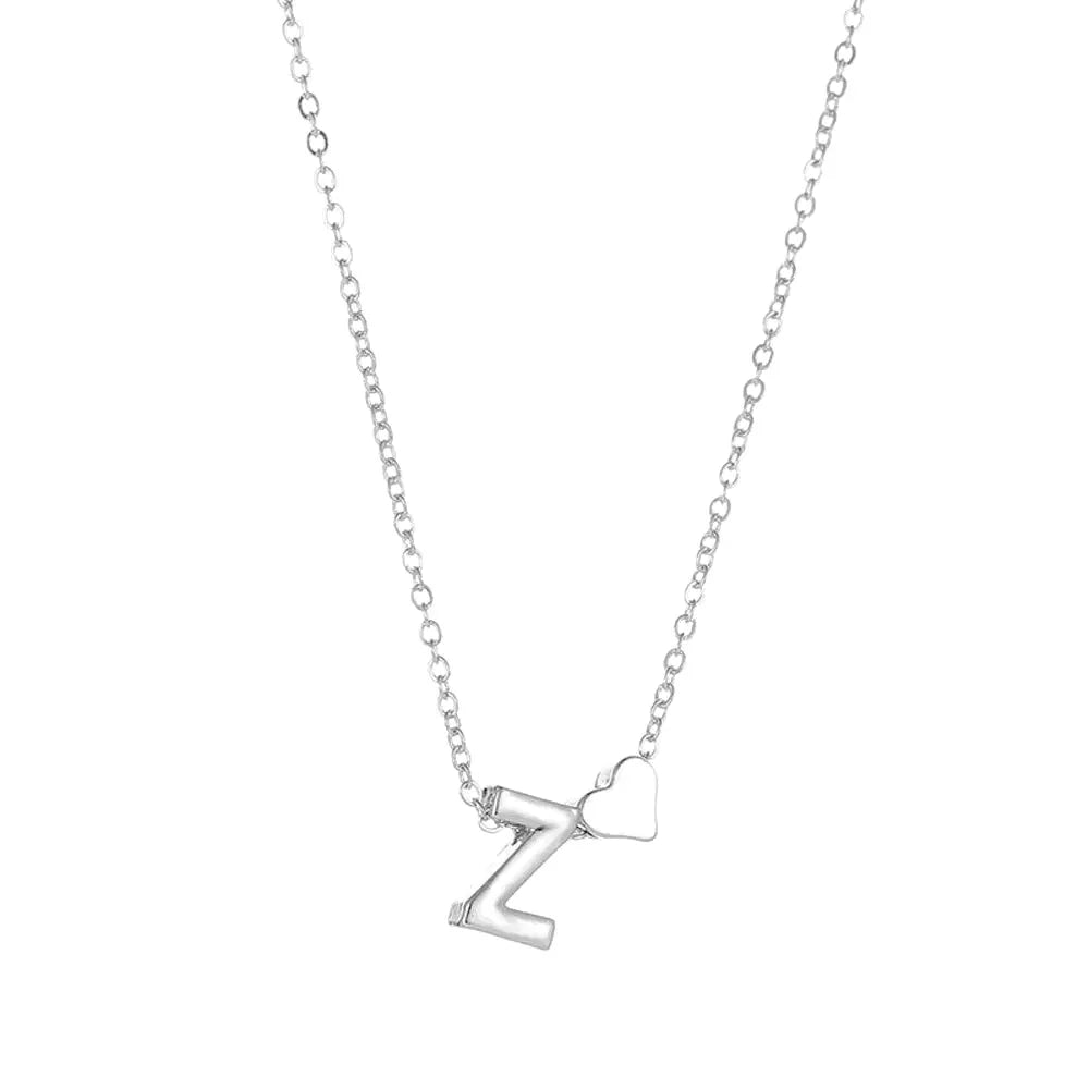 dainty heart accented letter initial necklace