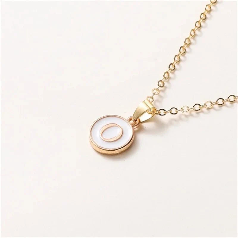 gold accented circle letter initial necklace