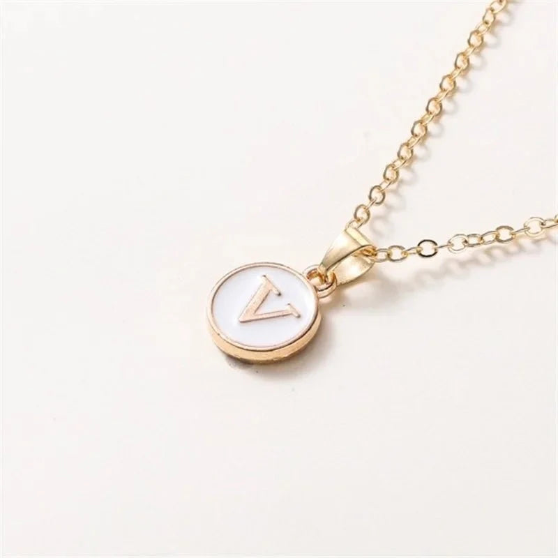 gold accented circle letter initial necklace