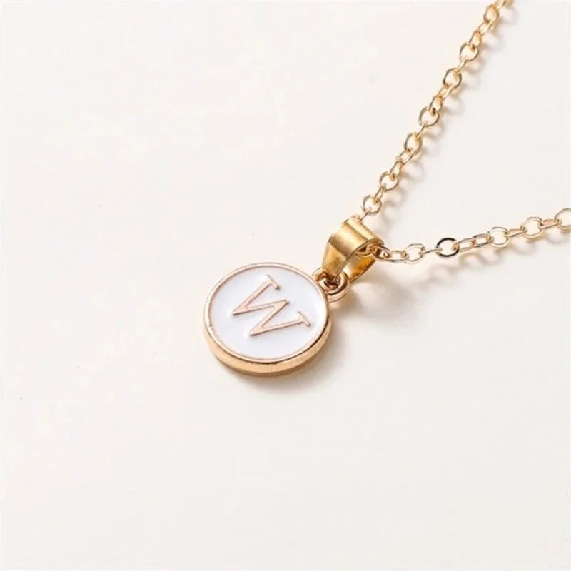 gold accented circle letter initial necklace