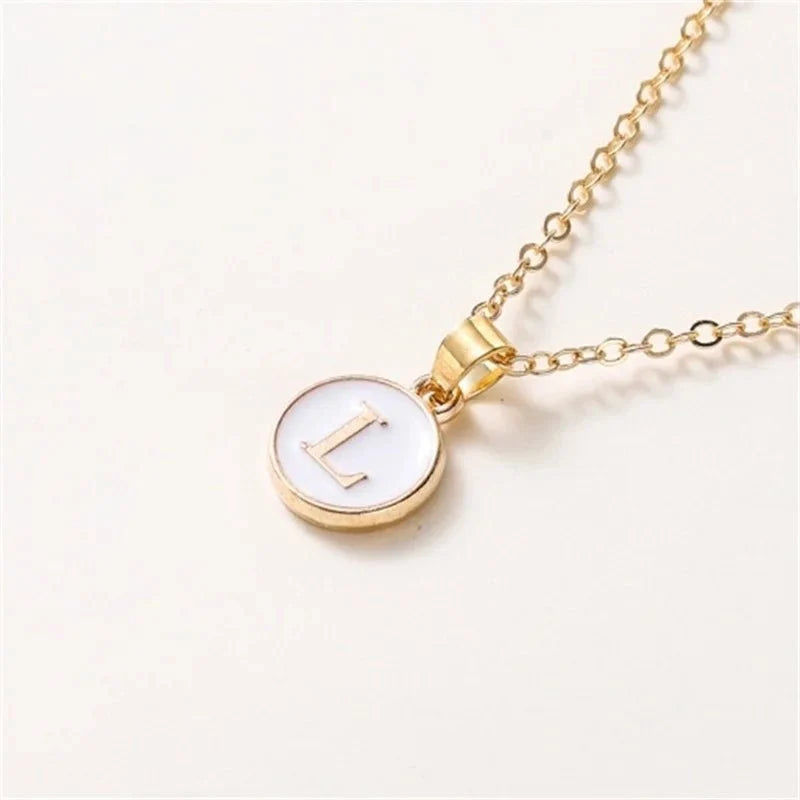 gold accented circle letter initial necklace