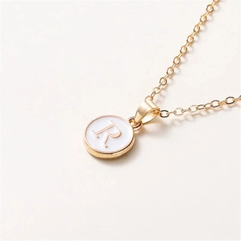 gold accented circle letter initial necklace