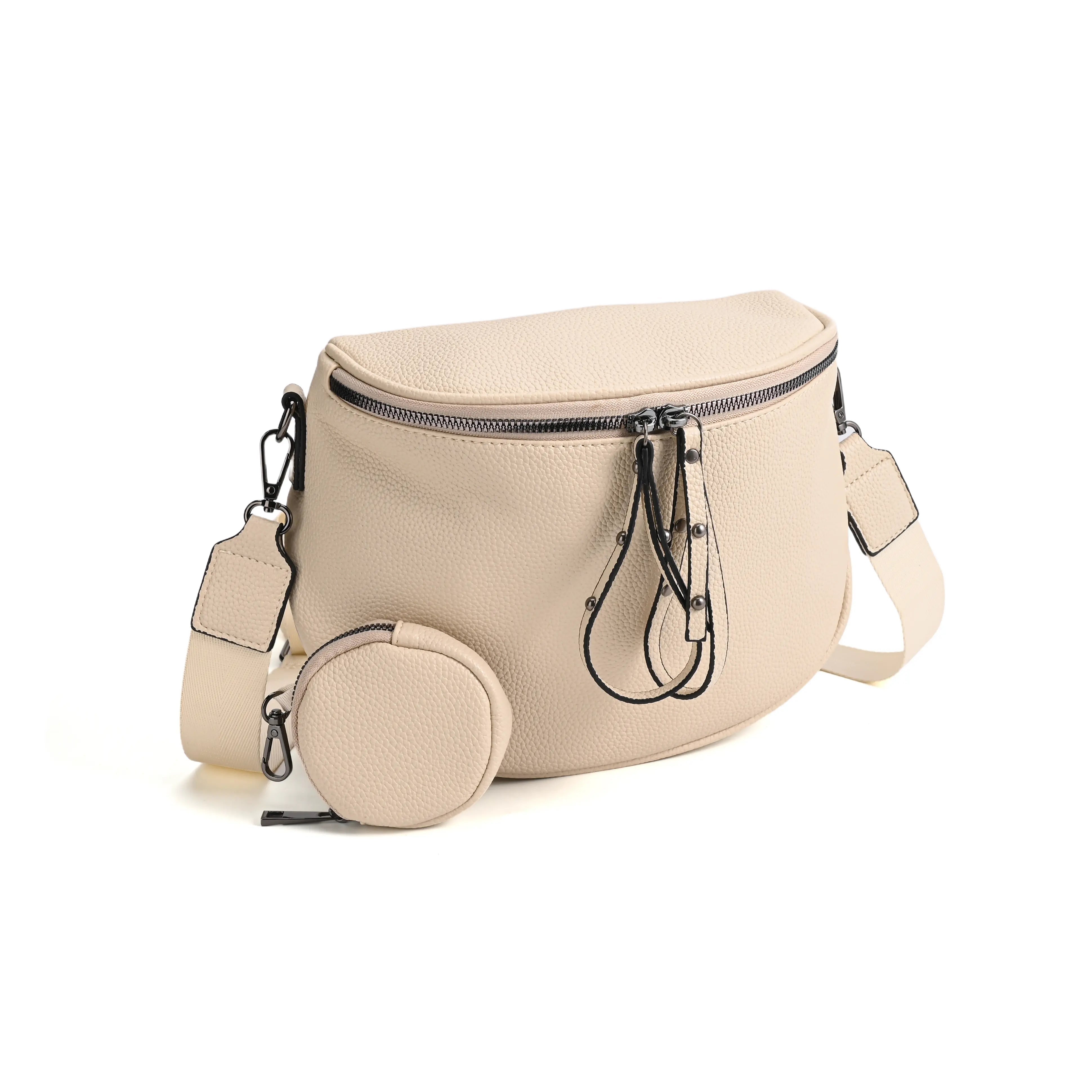 half moon cross body bag with detachable pouch