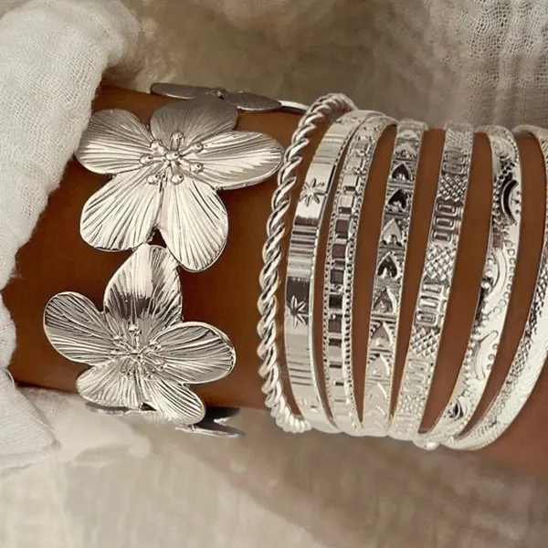 8pc Floral Accented Adjustable Textured Cuff Stack in silver