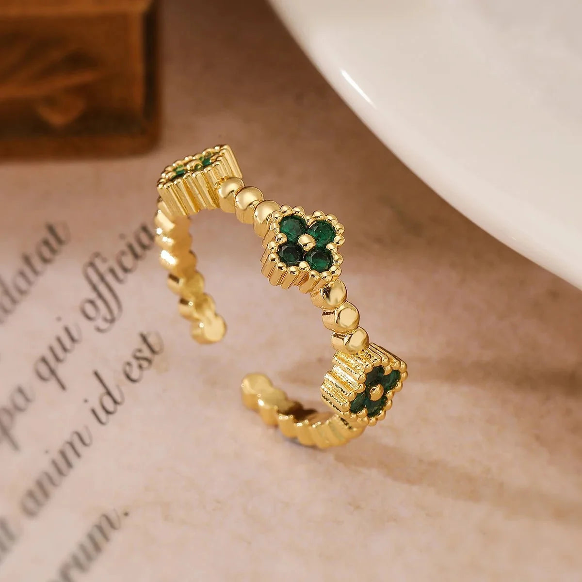 Resizable Trio Textured Floral Rings in green