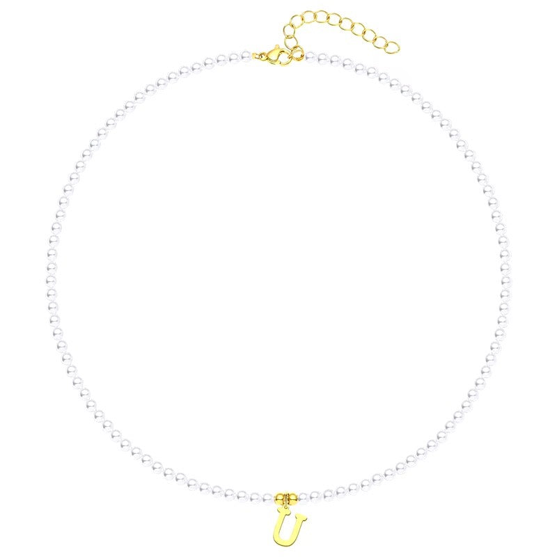 elegant gold accented pearl letter initial necklace