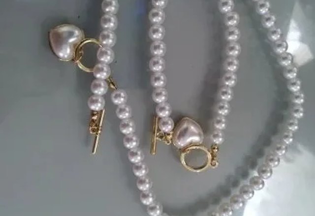 2pc Beaded Heart Pendant Bracelet and Necklace Set worn by a customer