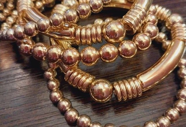 5pc Beaded Bracelet Stack Set worn by a customer