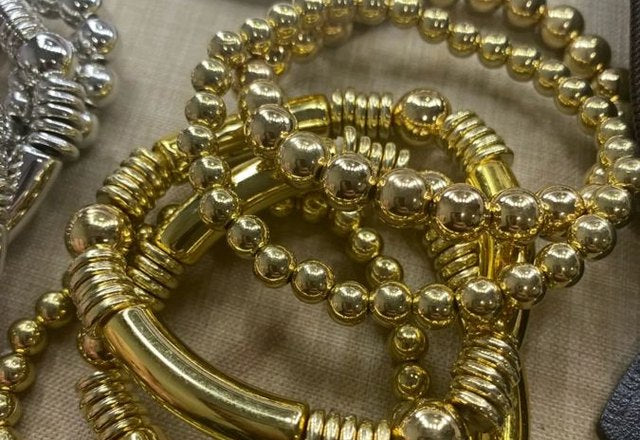 5pc Beaded Bracelet Stack Set worn by a customer