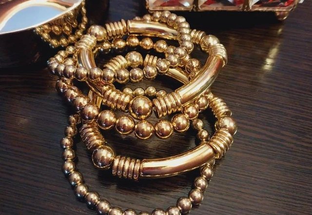5pc Beaded Bracelet Stack Set worn by a customer