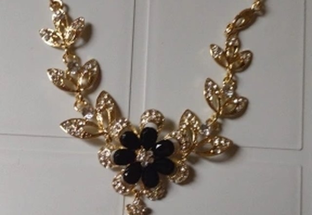 Floral Diamond Necklace and Earring Set worn by a customer