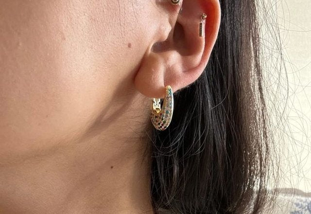 Chunky Glittering Diamond Hoop Earrings worn by a customer