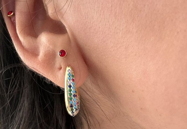Chunky Glittering Diamond Hoop Earrings worn by a customer