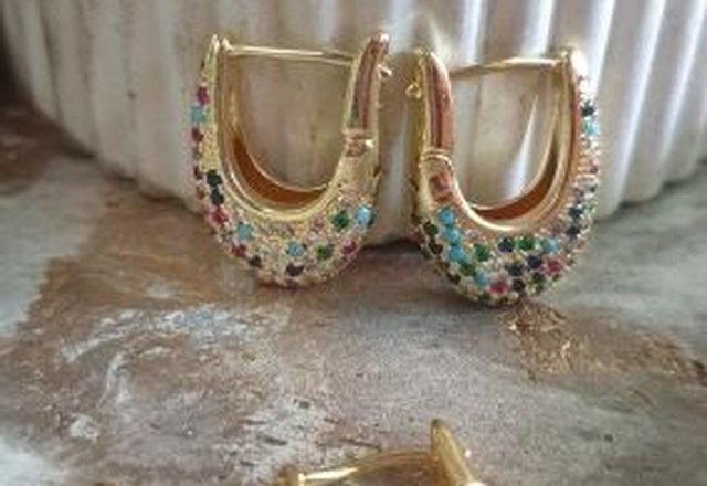 Chunky Glittering Diamond Hoop Earrings worn by a customer