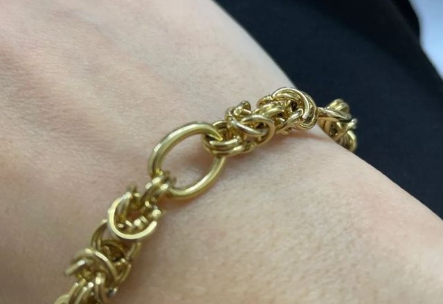 Contrasting Statement Chain Bracelet worn by a customer