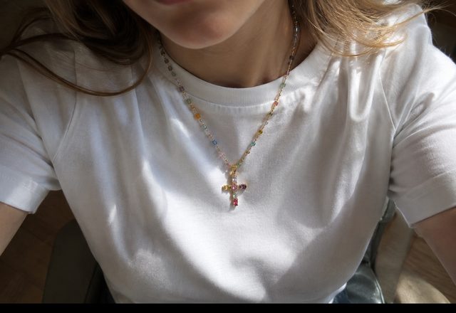Dainty Colorful Gem Set Cross Necklace worn by a customer