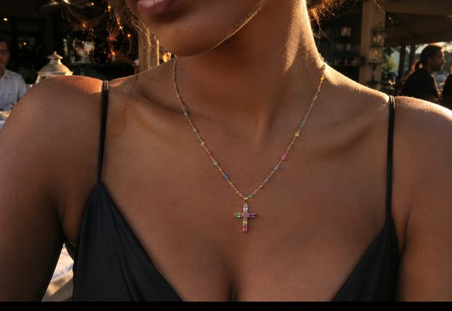 Dainty Colorful Gem Set Cross Necklace worn by a customer