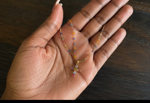 Dainty Colorful Gem Set Cross Necklace worn by a customer