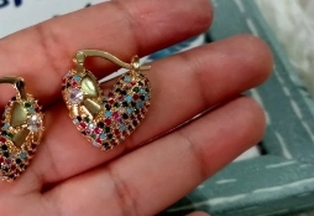 Glamorous Diamond Heart Earrings worn by a customer