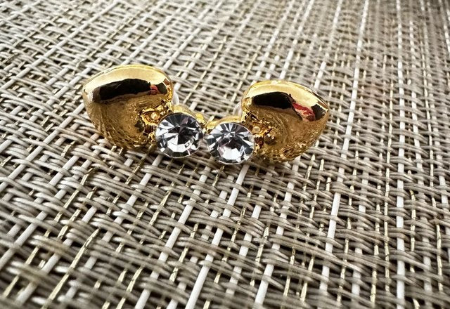 Dainty Diamond Heart Stud Earrings worn by a customer