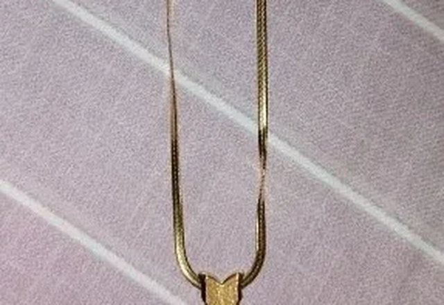 Dainty Herringbone Butterfly Dangle Necklace worn by a customer