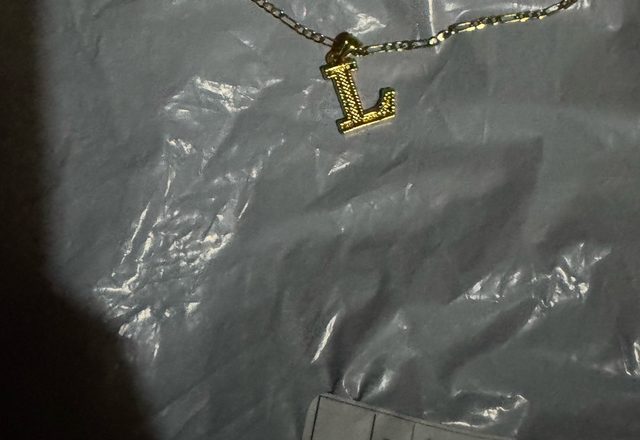 2pc 14k Initial & Cross Necklace Set worn by a customer