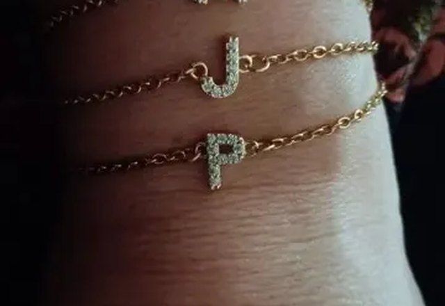 Dainty Initial Chain Bracelet worn by a customer