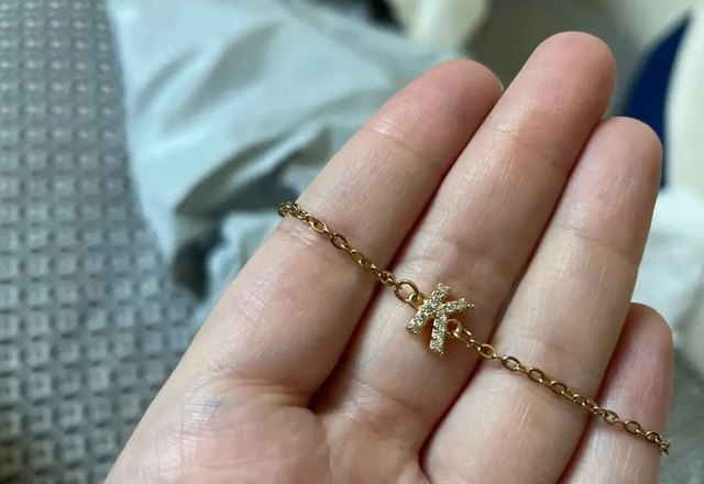 Dainty Initial Chain Bracelet worn by a customer