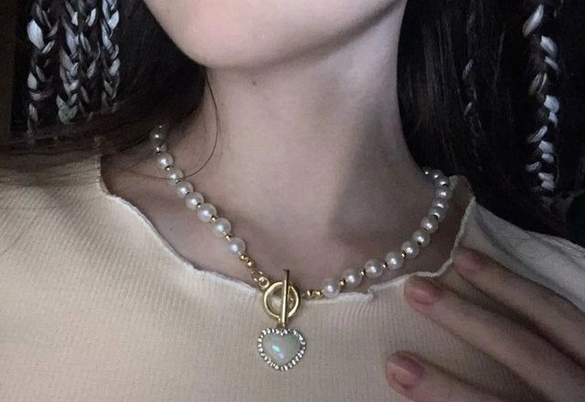 Pearl Heart Clasp Choker Necklace worn by a customer