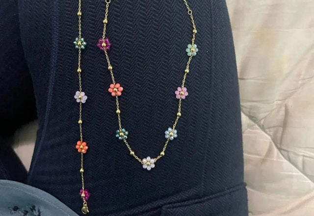 Dainty Spring Floral Jewelry Collection worn by a customer