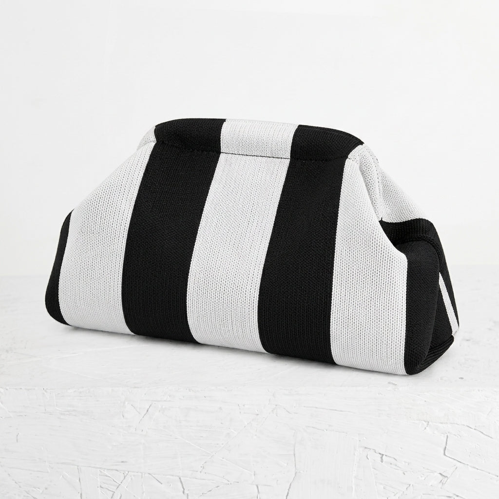 woven striped pouch clutch