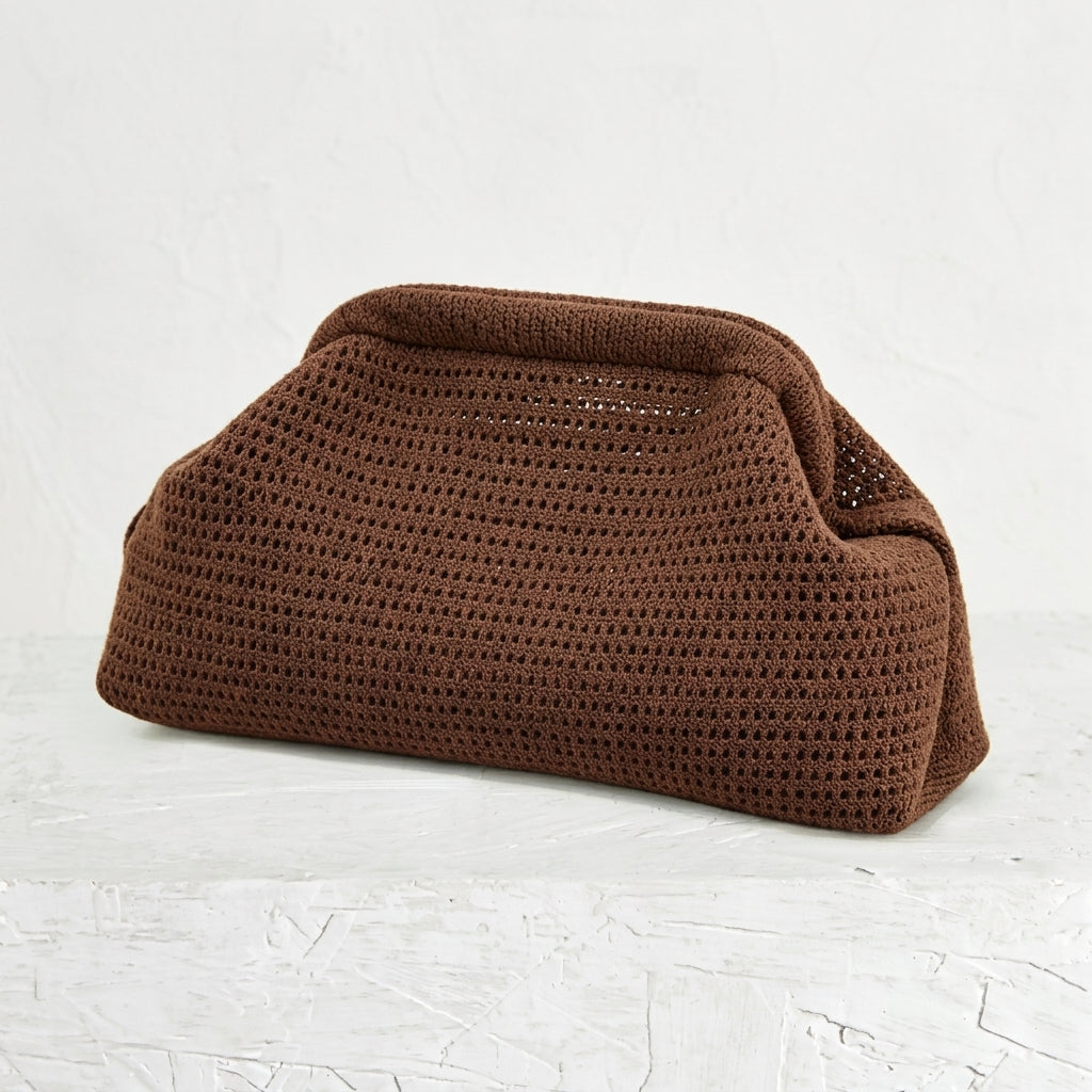 woven striped pouch clutch