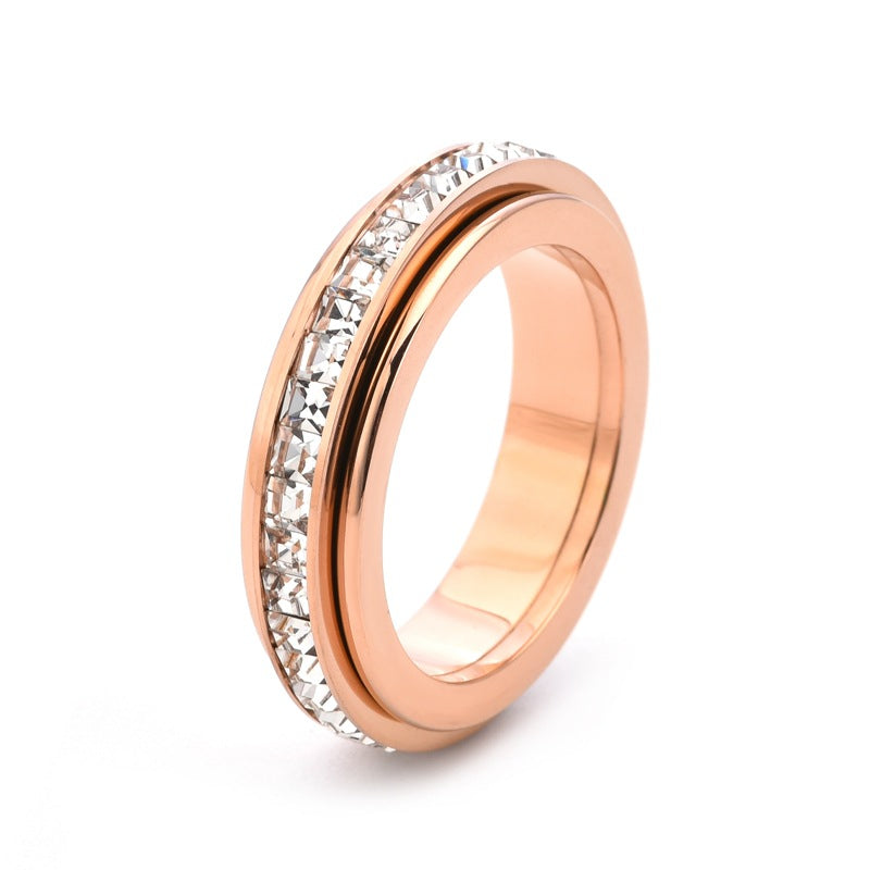 Simulated Diamond Accented Rotating Anxiety Relief Ring in rose gold