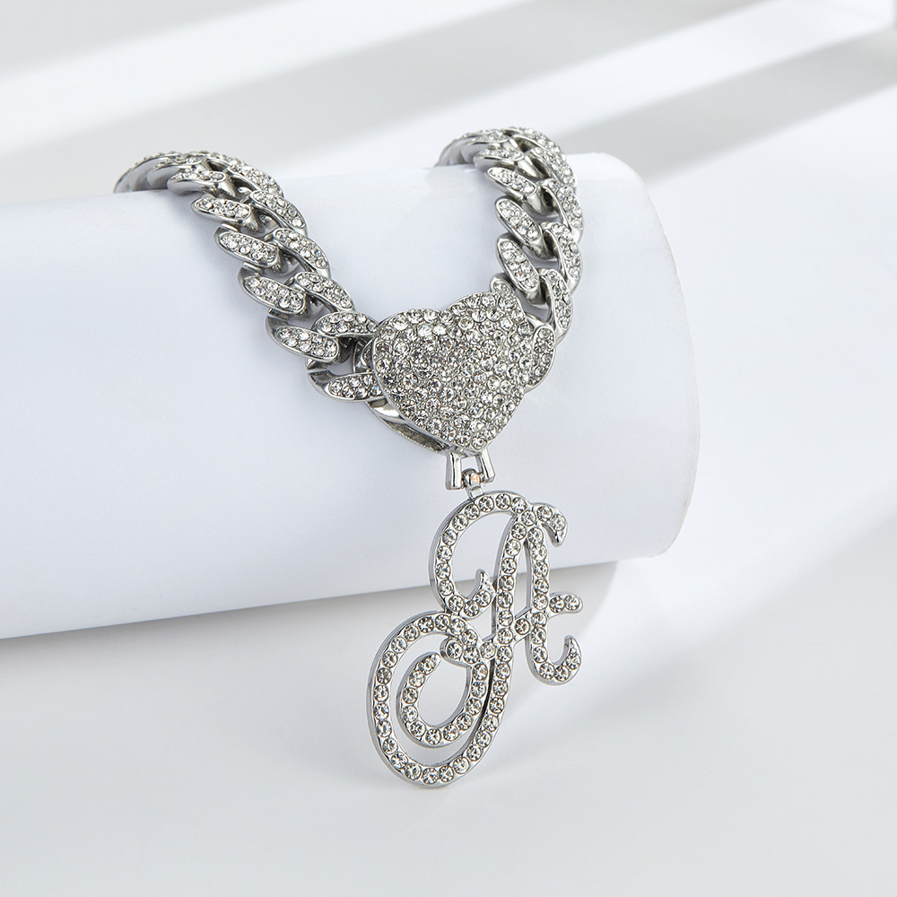 Cursive Diamond Accented Initial Cuban Heart Necklace in silver