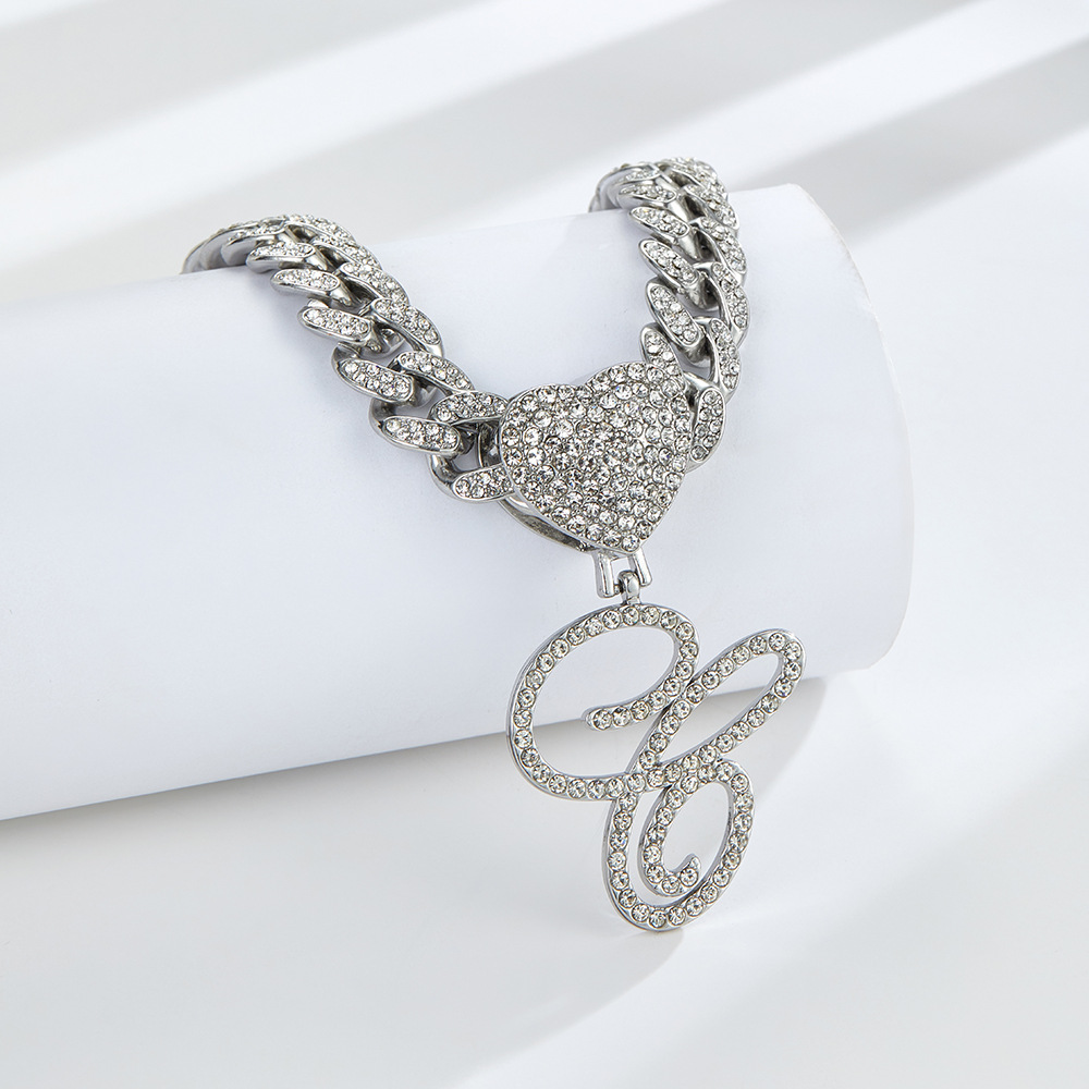Cursive Diamond Accented Initial Cuban Heart Necklace in silver